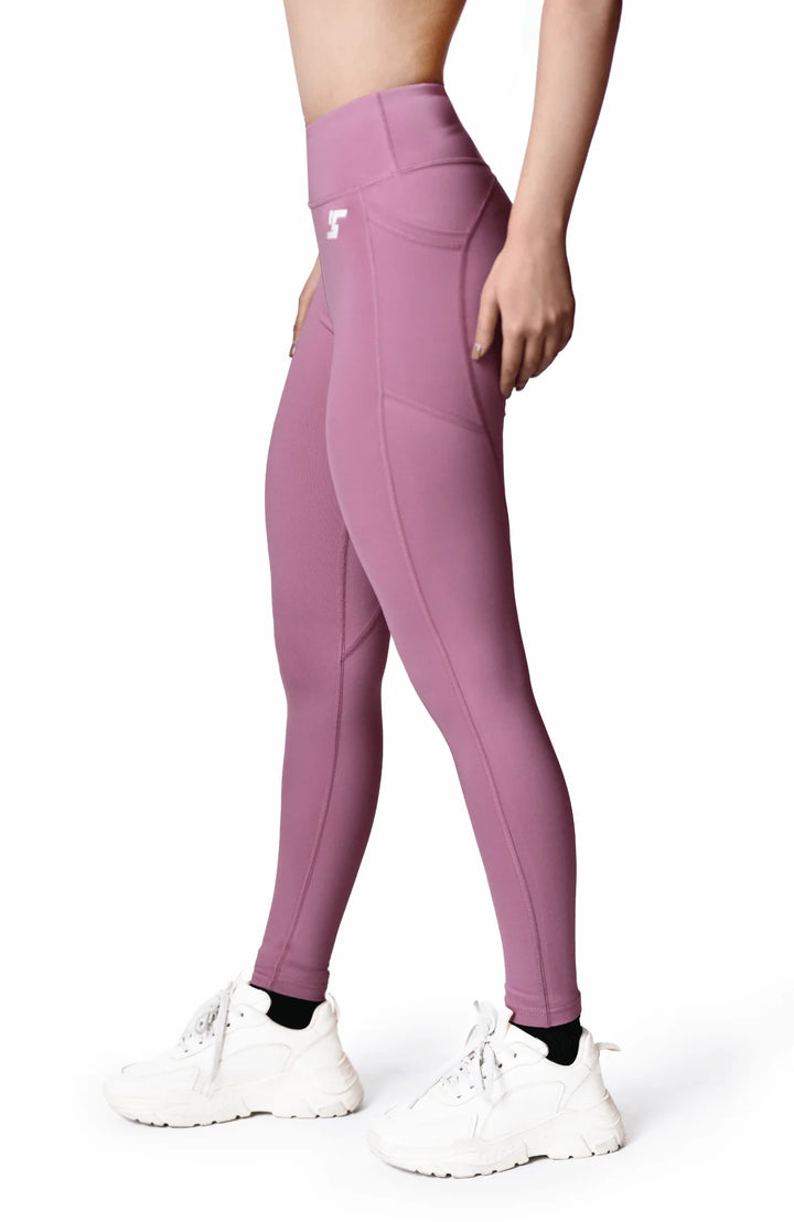 Soft, stretchy women's purple leggings designed for comfort and style, perfect for various activities and casual wear.