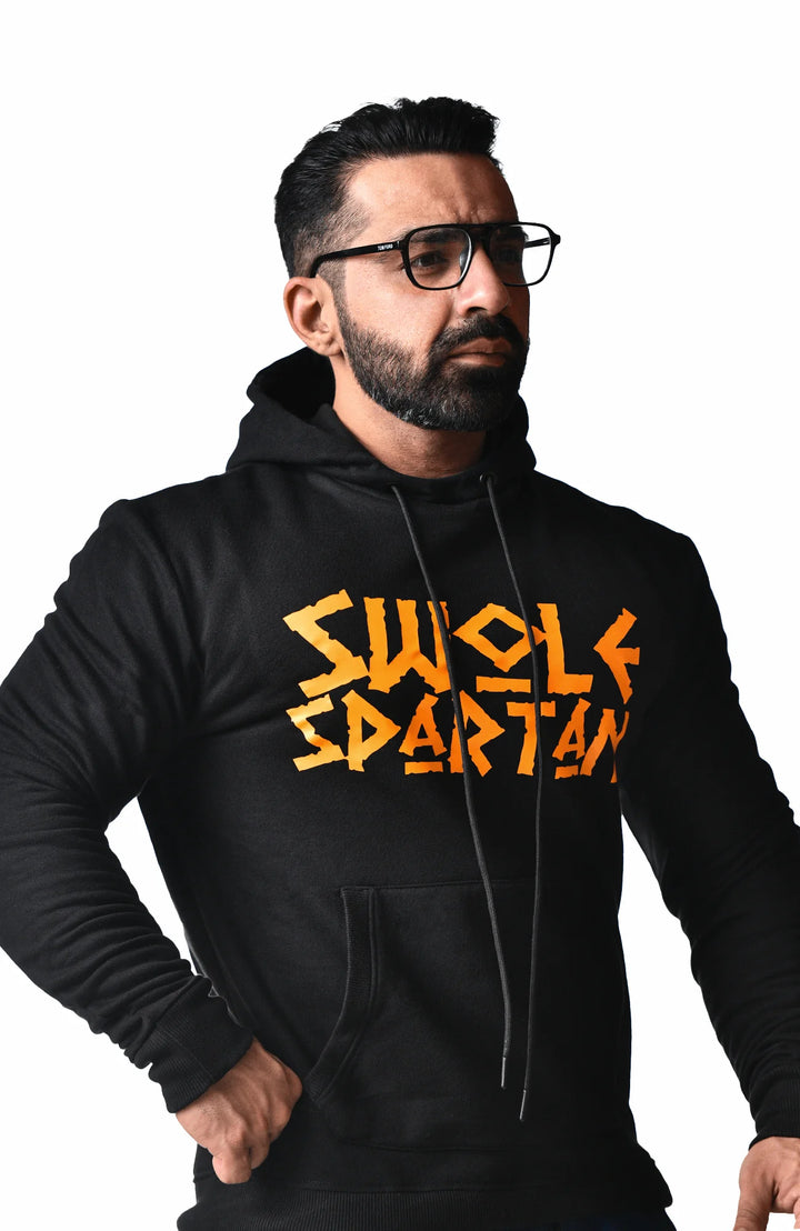 A man dressed in a black hoodie that has the words "susu bardan" printed across the chest.