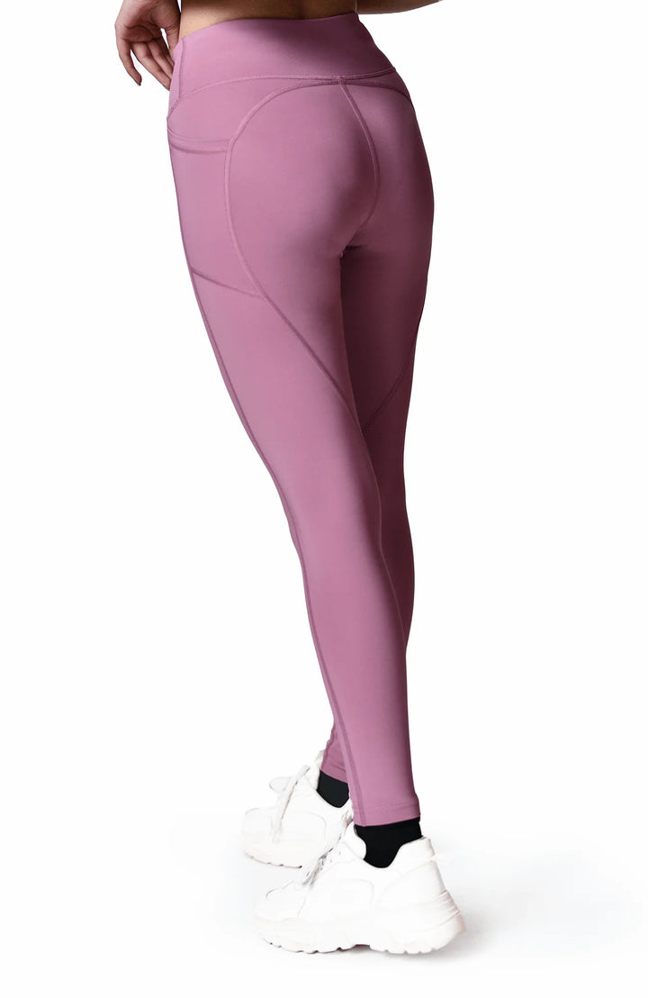 Soft, stretchy women's purple leggings designed for comfort and style, perfect for various activities and casual wear.