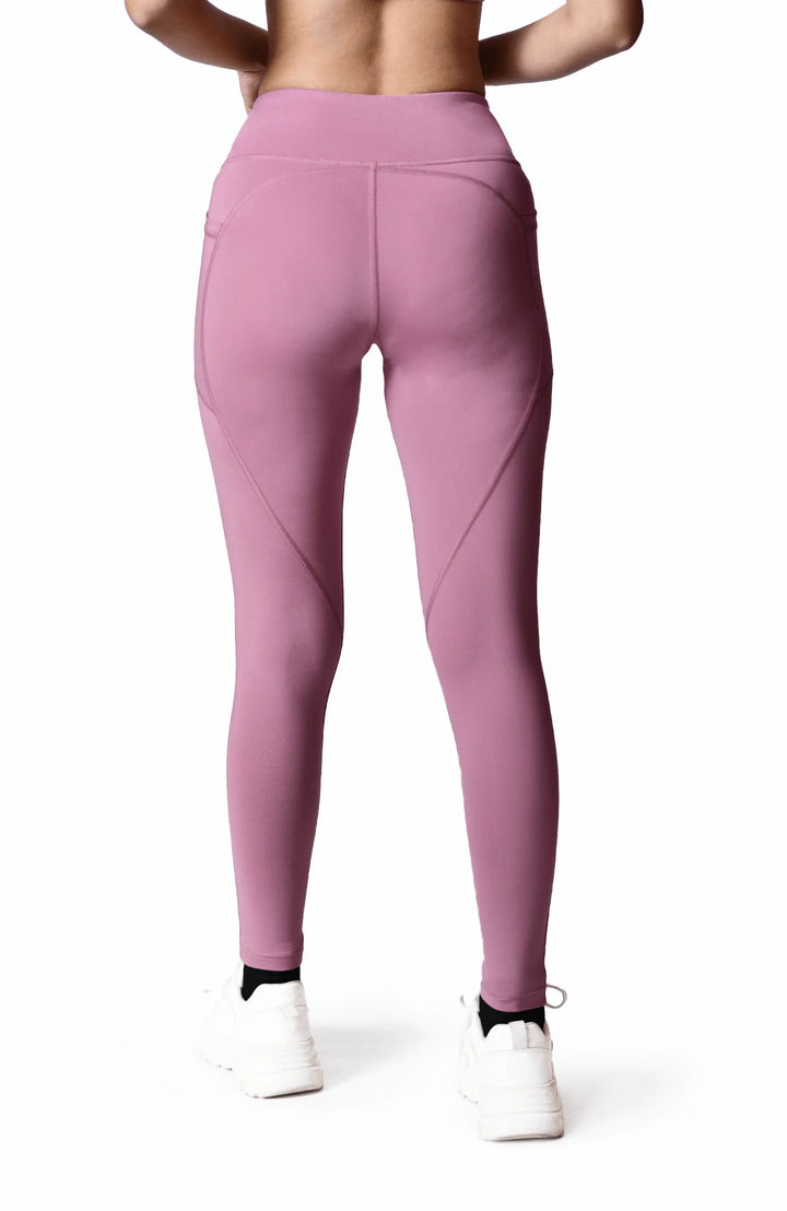 Soft, stretchy women's purple leggings designed for comfort and style, perfect for various activities and casual wear.