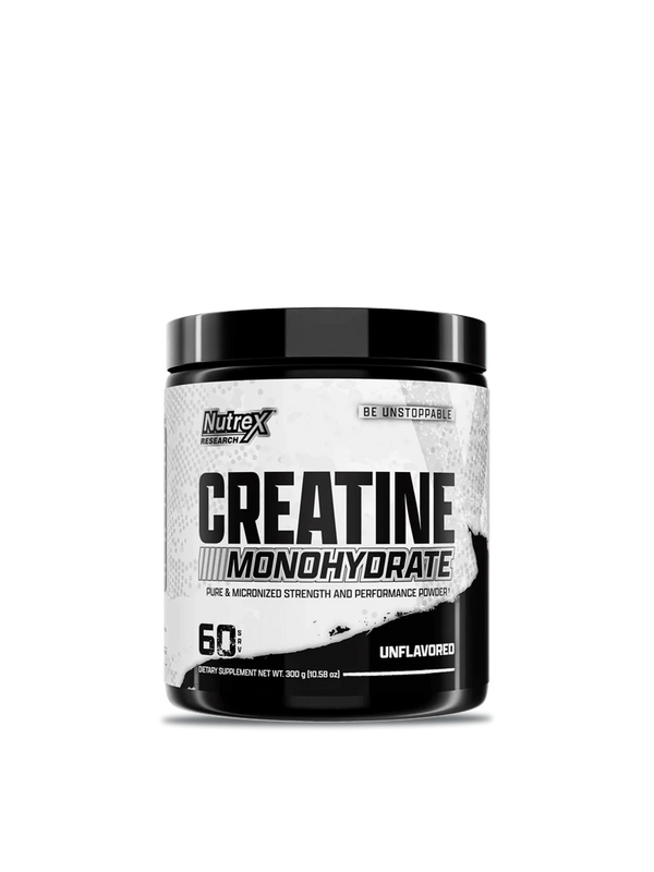 A small scoop of creatine monohydrate powder resting on a surface, highlighting its pure white color and fine consistency