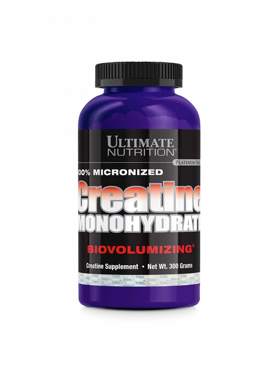 A container of ultimate nutrition creatine monohydrate, showcasing its label and product design against a neutral background.
