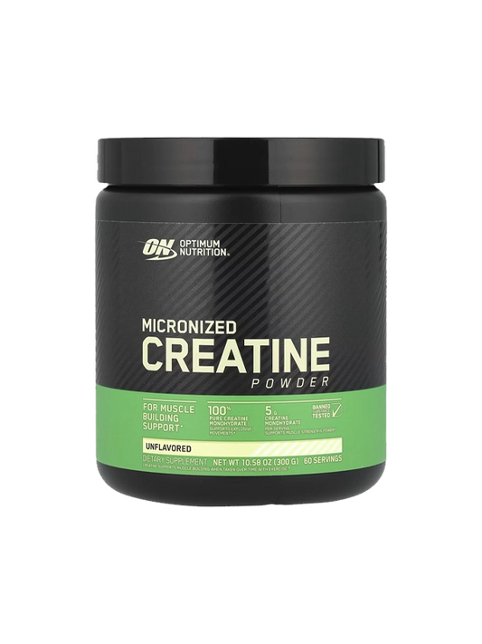 Micronised Creatine powder displayed in a scoop, emphasizing its role as a protein supplement for athletic performance.