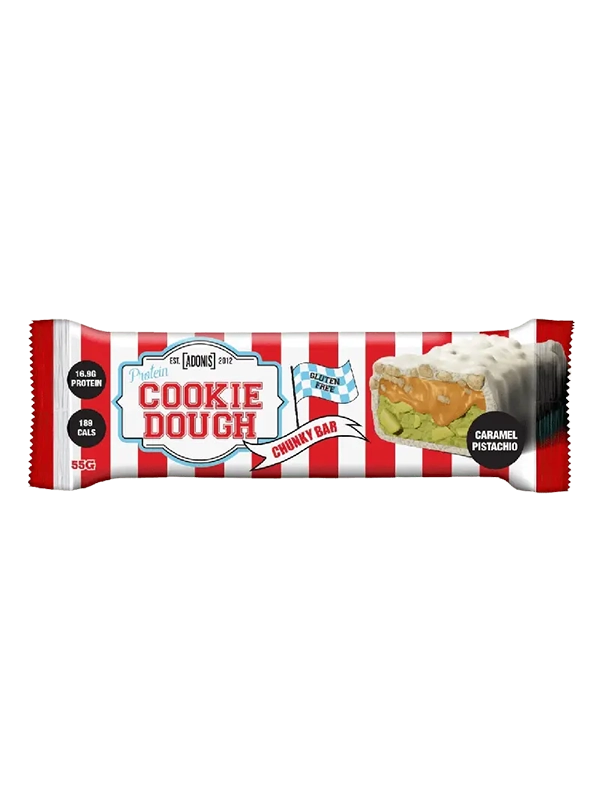 Protein Cookie Dough Chunky Bar cut open to show layers of caramel, pistachio, and cookie dough