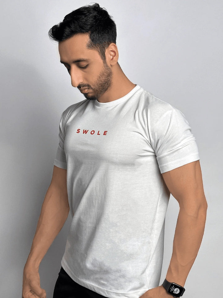 A plain white t-shirt featuring a subtle smoke design, showcasing a modern and minimalist aesthetic.