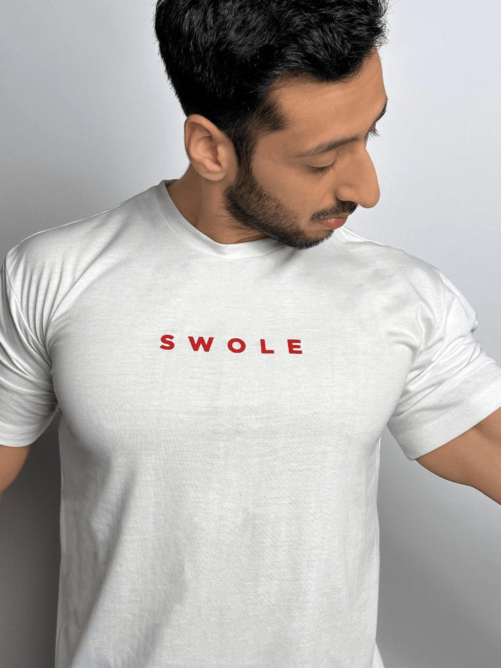 A plain white t-shirt featuring a subtle smoke design, showcasing a modern and minimalist aesthetic.