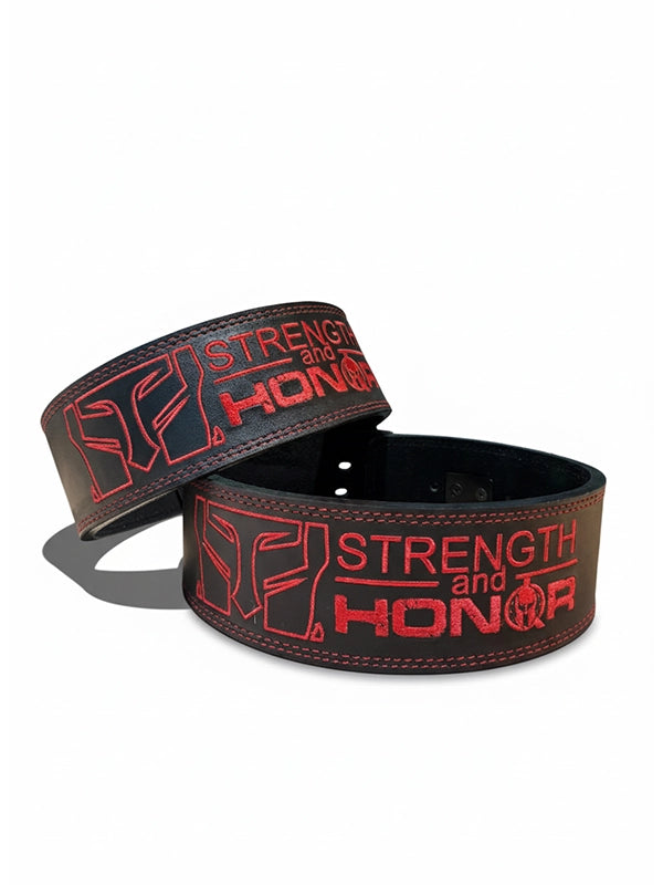 Two leather belts with 'Strength and Honor' text on a white background